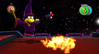 Mario combatte contro Boss Kamek nella missione Attacco alla Flotta Kamek.
